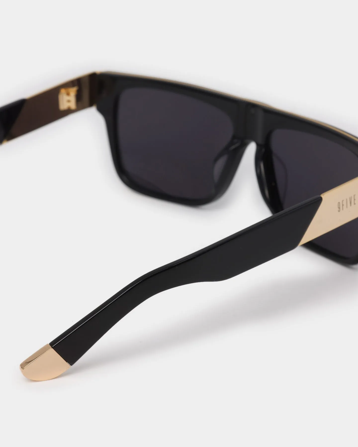 Elegant Black Sunglasses with Gold Accents