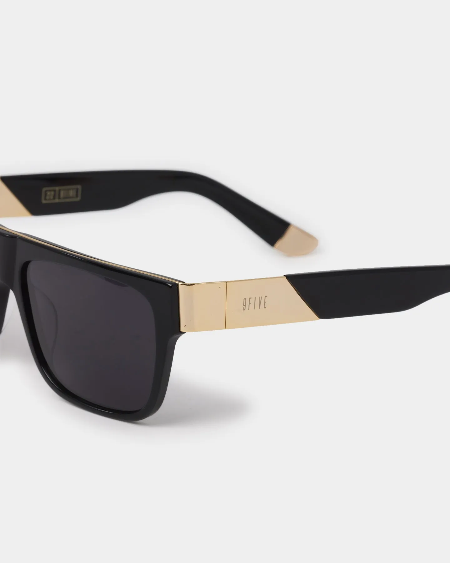 Elegant Black Sunglasses with Gold Accents