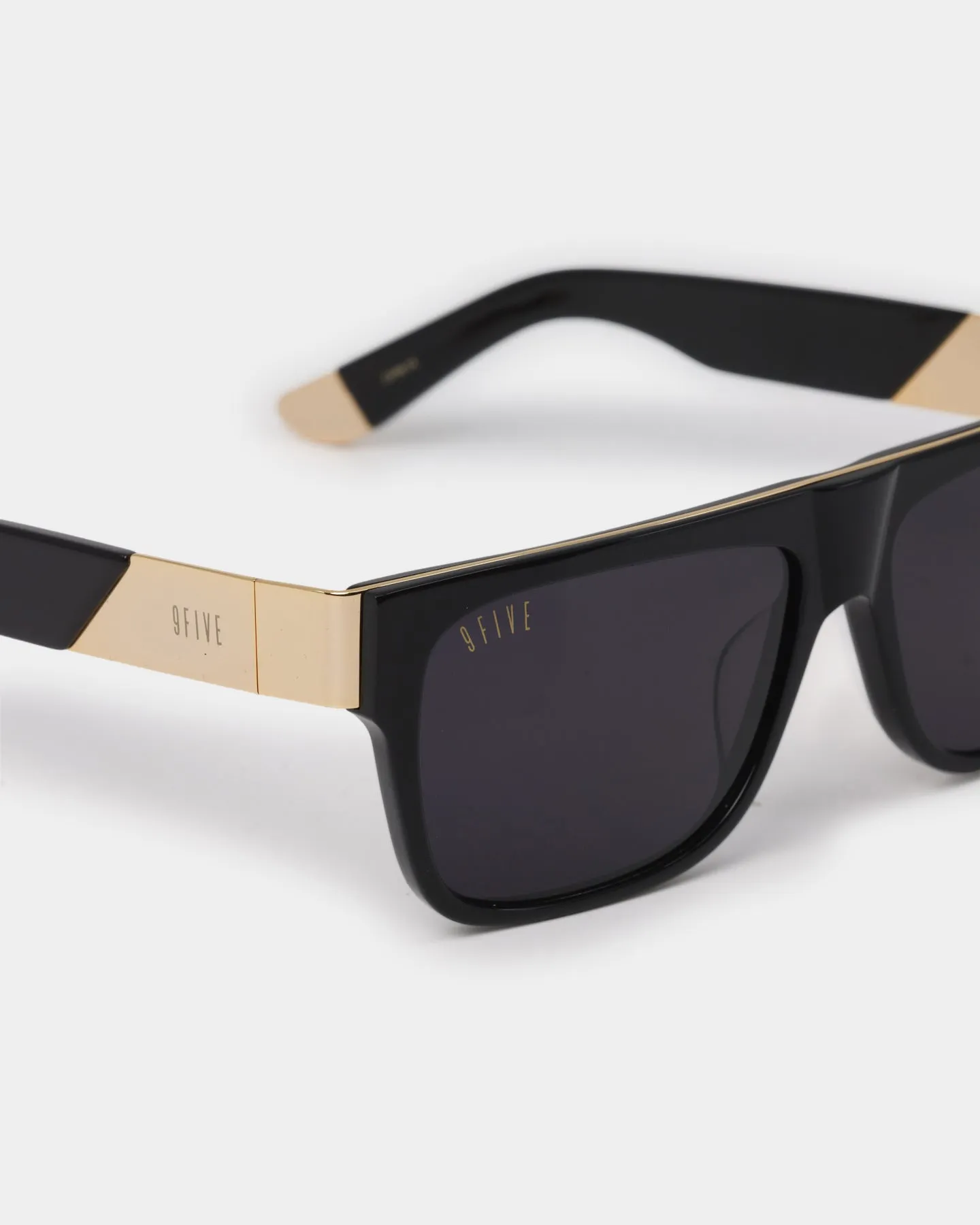 Elegant Black Sunglasses with Gold Accents